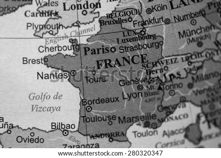 Map view of France on a geographical globe. (black and white)
