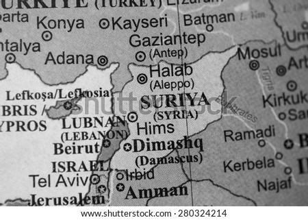 Map view of Syria on a geographical globe. (black and white)
