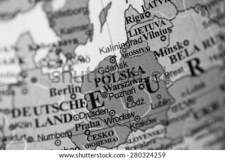 Map view of Poland on a geographical globe. (black and white)