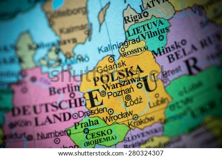 Map view of Poland on a geographical globe. (vignette)