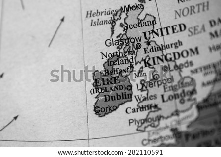 Map view of Ireland on a geographical globe. (black and white)