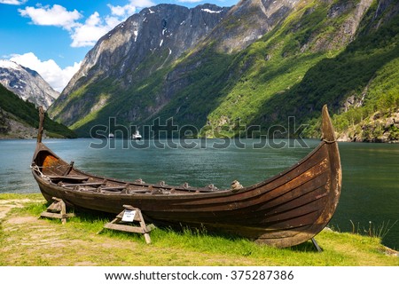 Old viking boat replica in a norwegian landscape near Flam, Norway.