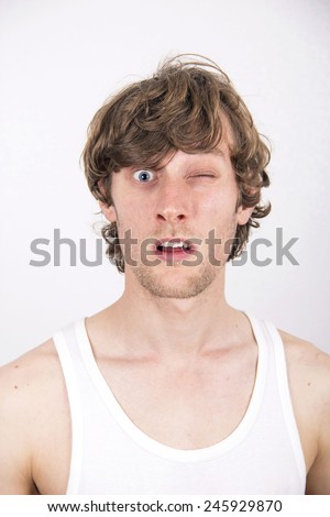 man with one eye open