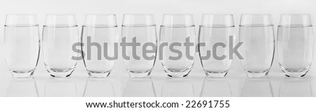Eight glasses of water isolated