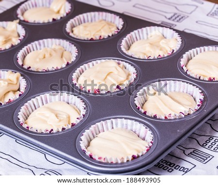 cake mix putted in to baking tray and ready for bake muffins