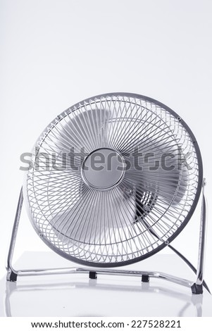 Electric retro style fan on the white background