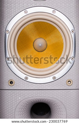 close up of orange audio speaker