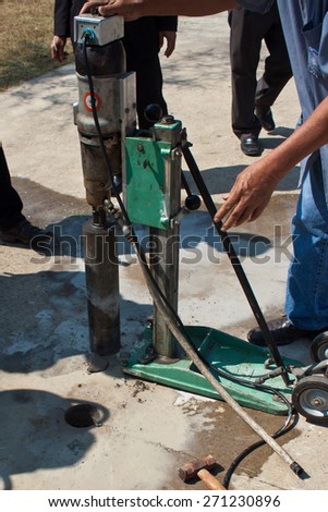 coring sample concrete road to test strength : construction work
