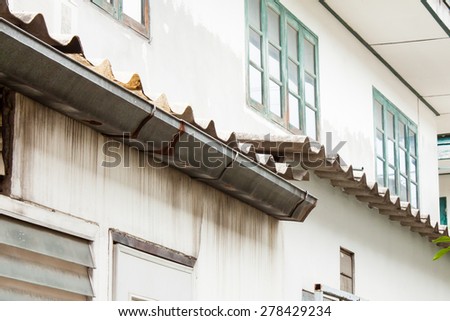 house metal roof gutters poor condition want to repair