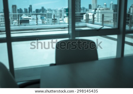 abstract office blurry background with cold tone filter