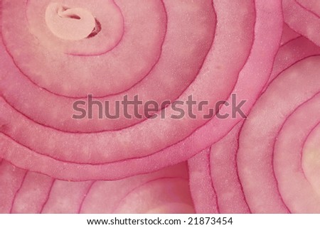File name: Closeup of red onion slices.