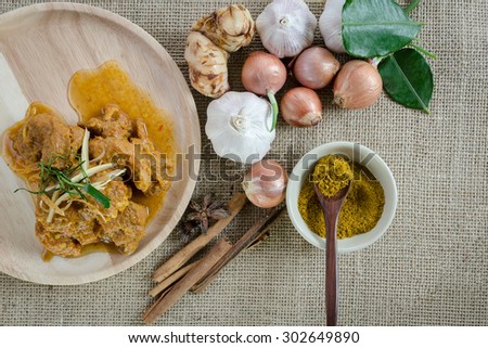 Indian Spices Curry food with herbs and curry powder on the wood dish