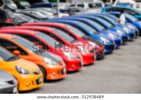 many colorful car in outdoor parking