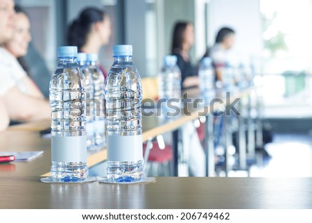 Bottles of water in conference room