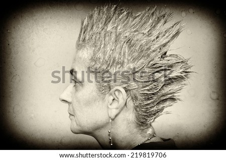 Portrait of a woman with shampooed spiky hair