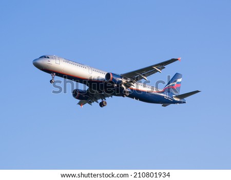 Moscow, Russia - July 13, 2014: The airline Airbus A321 plane Aeroflot sits down at the Sheremetyevo airport