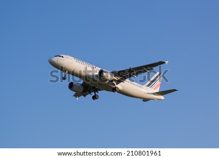Moscow, Russia - July 13, 2014: The plane of Air France airline comes on a strip before landing at the Sheremetyevo airport