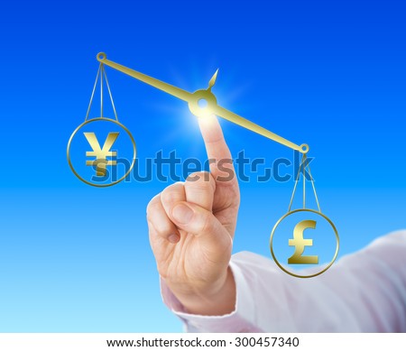 British Pound Sterling symbol is outweighing the Japanese Yen currency sign on a golden scale. Index finger of a white collar worker is touching the balance. Financial metaphor for forex trading.