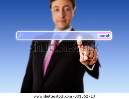 Smiling business manager is touching an empty search bar with his left index finger. Do write your web domain address into the void finder box. Selective focus. Plenty of copy space. Sky blue ground.
