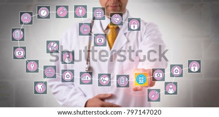 Unrecognizable male physician is highlighting a data block record in a healthcare blockchain. Health care IT concept for data sharing, distributed system, replicated database and governance issues.