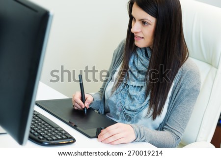 Young  female software engineer working in office