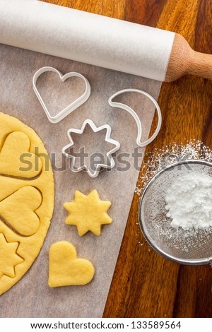 Making sugar cookies with cookie cutters