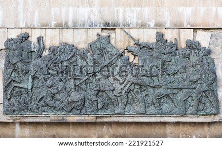 Medieval bas-relief at the base of the equestrian statue of Stephen III of Moldavia in Suceava, Romania