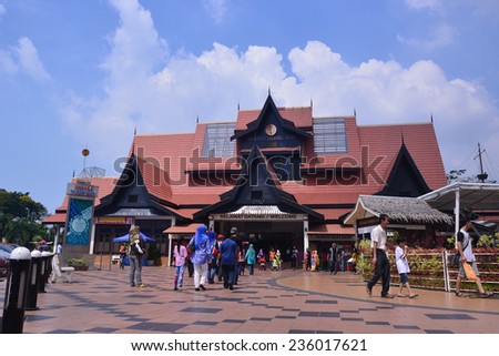 MALACCA, MALAYSIA - DEC 7, 2014: Tourist Visit Menara Taming Sari . Malacca City is the capital city of the Malaysian state of Malacca. It was listed as a UNESCO World Heritage Site on 7 July 2008