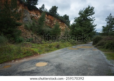 Season of bad roads. Spring roads after heavy rain at Evbia, Greece