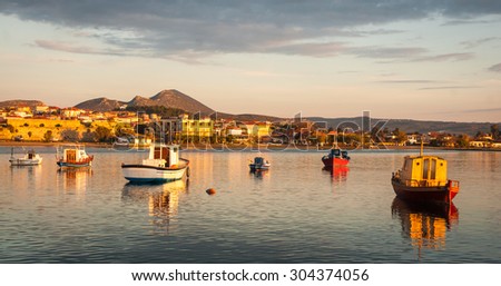 Image of fishing boats in the bay near Methoni, Peloponnese, Greece