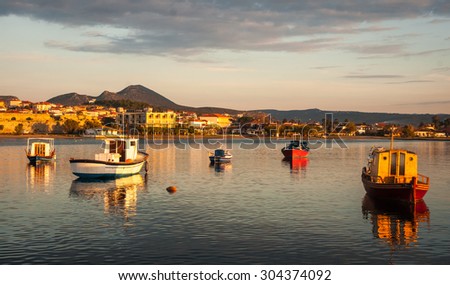 Image of fishing boats in the bay near Methoni, Peloponnese, Greece