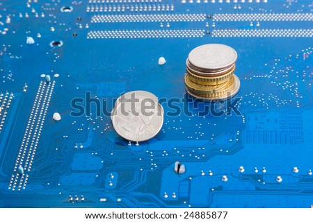 Make money on electronic commerce: dollar and euro coins on motherboard
