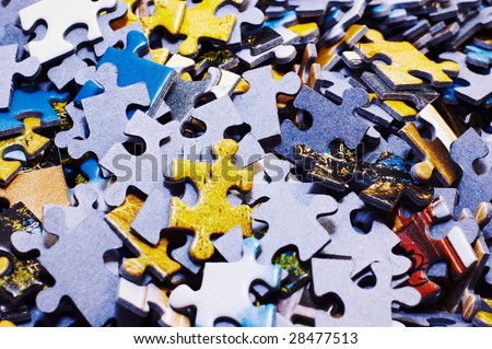 Task too difficult: pile of jigsaw puzzle pieces