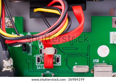 Inside electronic appliance - macro of circuit board with wires