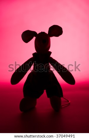 A guest from Fairyland - toy mouse in pink light
