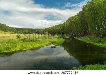 The river with a meadow and wood in the summer, Russia, Ural Mountains
