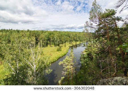 forest landscape with river and rocky coast, Russia, Ural