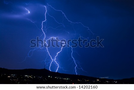 blue lightning over city landscape