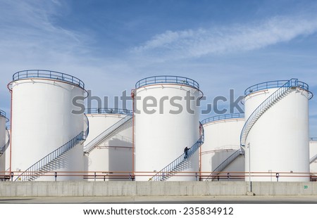 large white Industrial tanks for petrol and oil