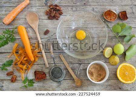 fruits and vegetables ingredients on wooden table with kitchen utensils and brown sugar