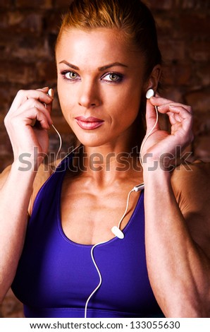 strong woman is going to listen music