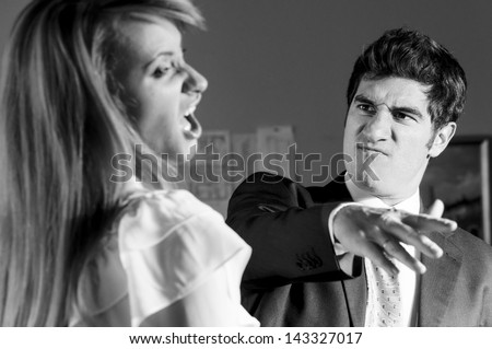 angry businesswoman is slapping across the businessman\'s face