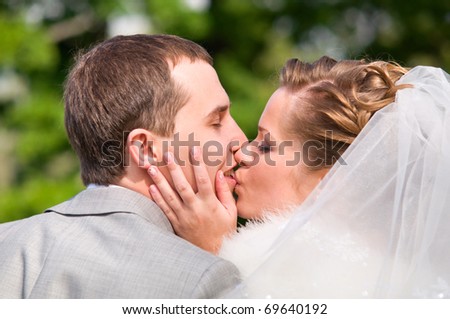 just married couple is kissing