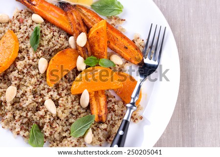 Grilled pumpkin and carrot, lemon, basil and almonds with quinoa