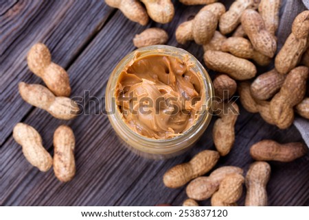 Fresh made creamy Peanut Butter in a glass jar