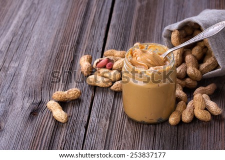 Fresh made creamy Peanut Butter in a glass jar