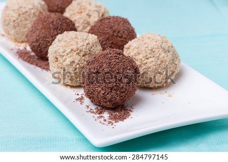 Homemade candies with chocolate and almonds powder