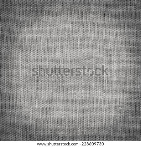 Light gray linen coarse natural woven canvas fabric texture for the background