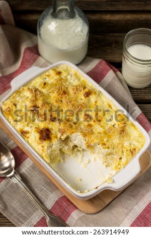 Macaroni and cheese gratin casserole  with feta. Rustic style