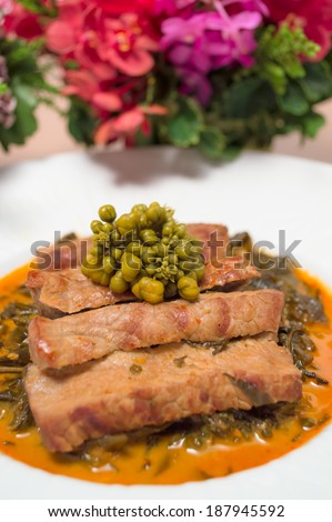 cassioa leaf and flower curry with roasted meat
